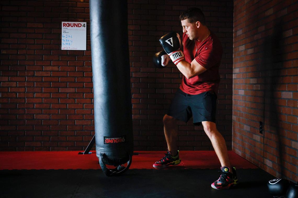 Justin Ashley, an American history teacher at Community House Middle School, works out at Round9 fitness studio in Charlotte. Over the years as educator Ashley has battled depression, anxiety and dependence on prescription drugs, he has found boxing as one of the many ways to help cope with stress.