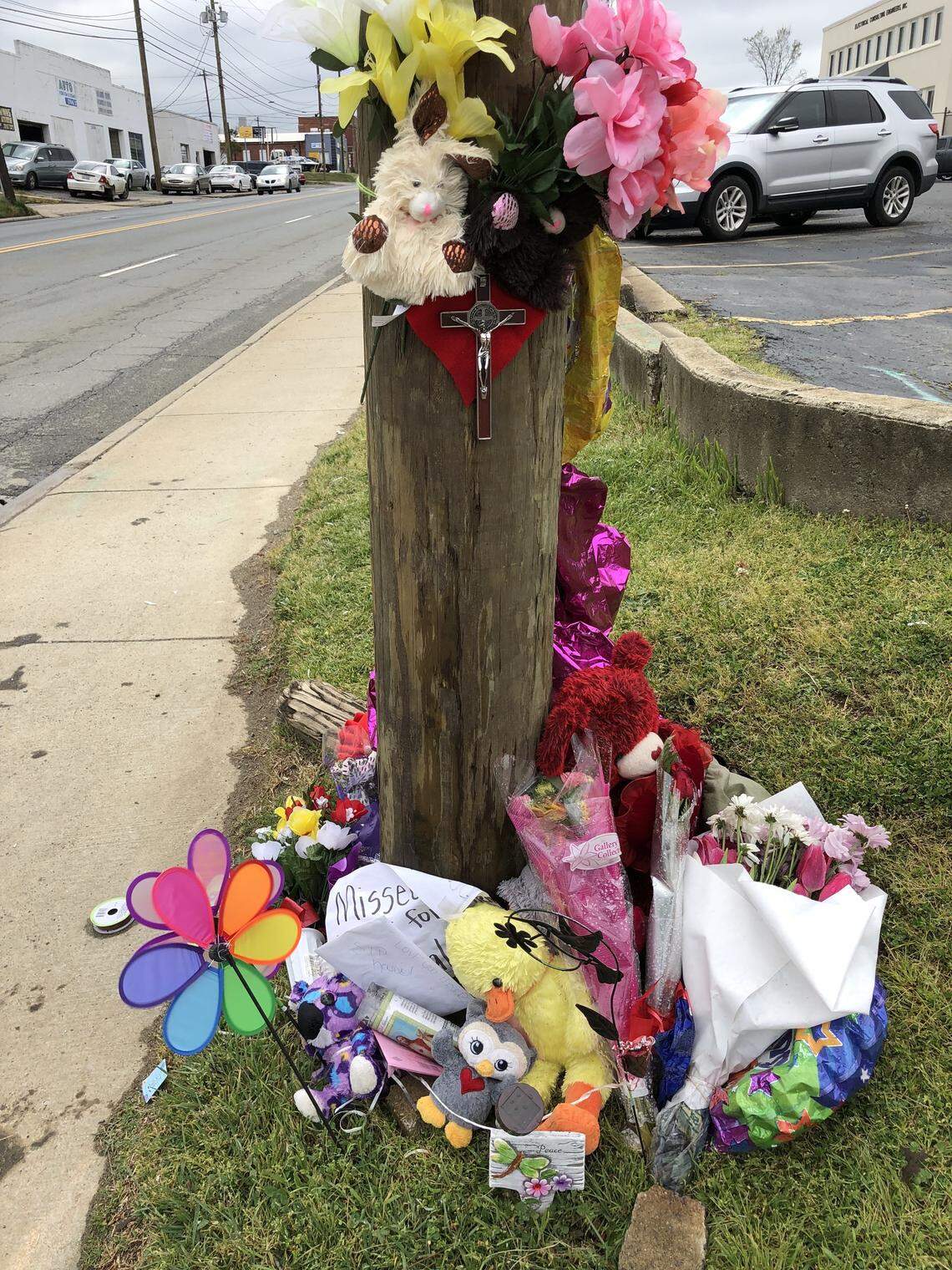 Flowers and other remembrances left at the corner of Tryon and 28th streets, where Kendal Crank died last Thursday.