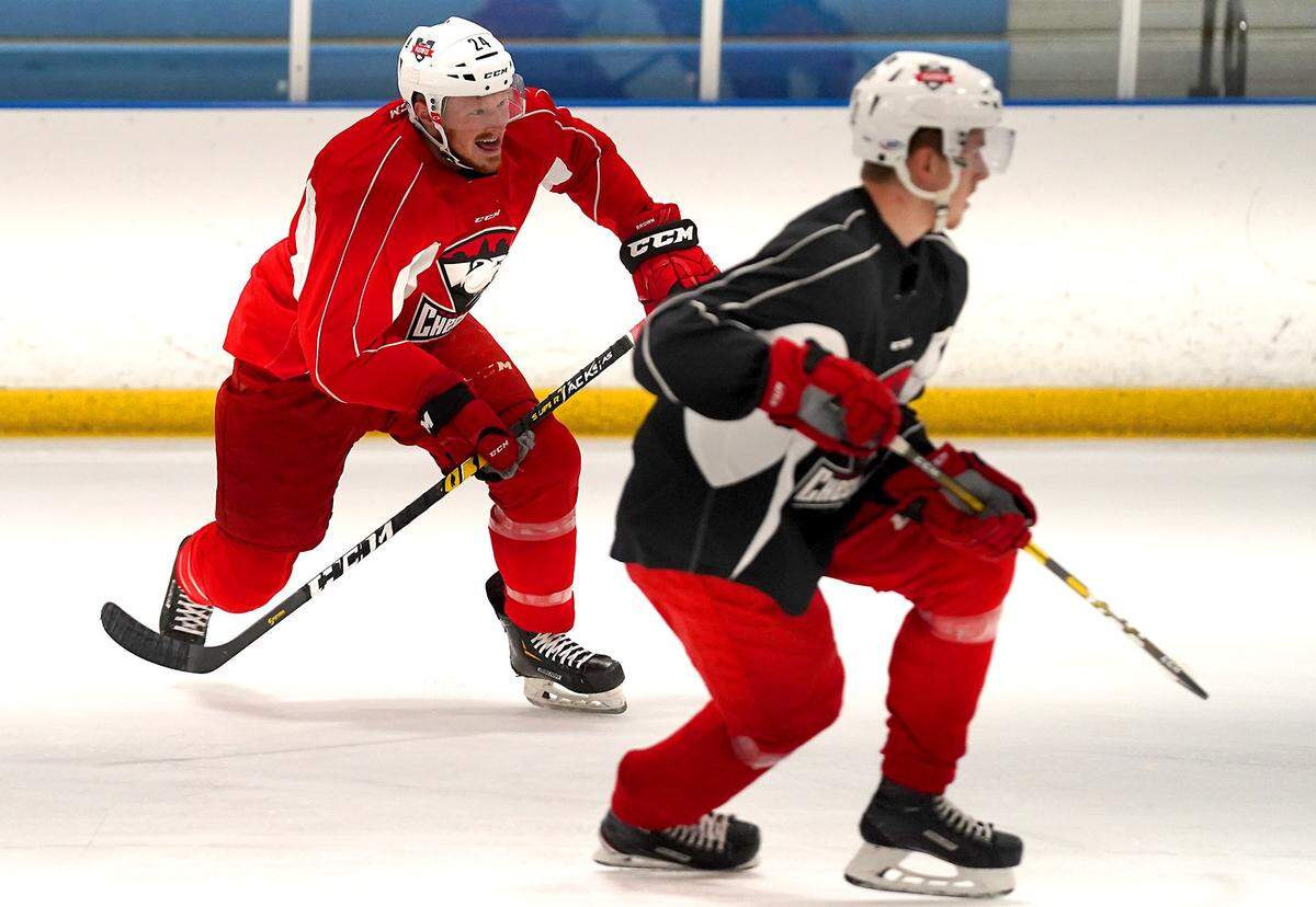 Charlotte’s Patrick Brown, left, has been a captain for the Checkers for each of the past three years. He is also a cousin of actresses Kate and Rooney Mara.