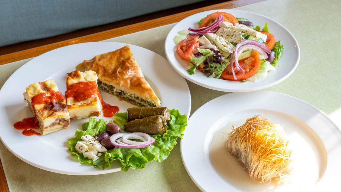 Landmark Diner’s Greek Combo includes spanakopita, grape leaves, feta, olives, Greek pastitsio and a Greek salad. The dessert is kataïfi.