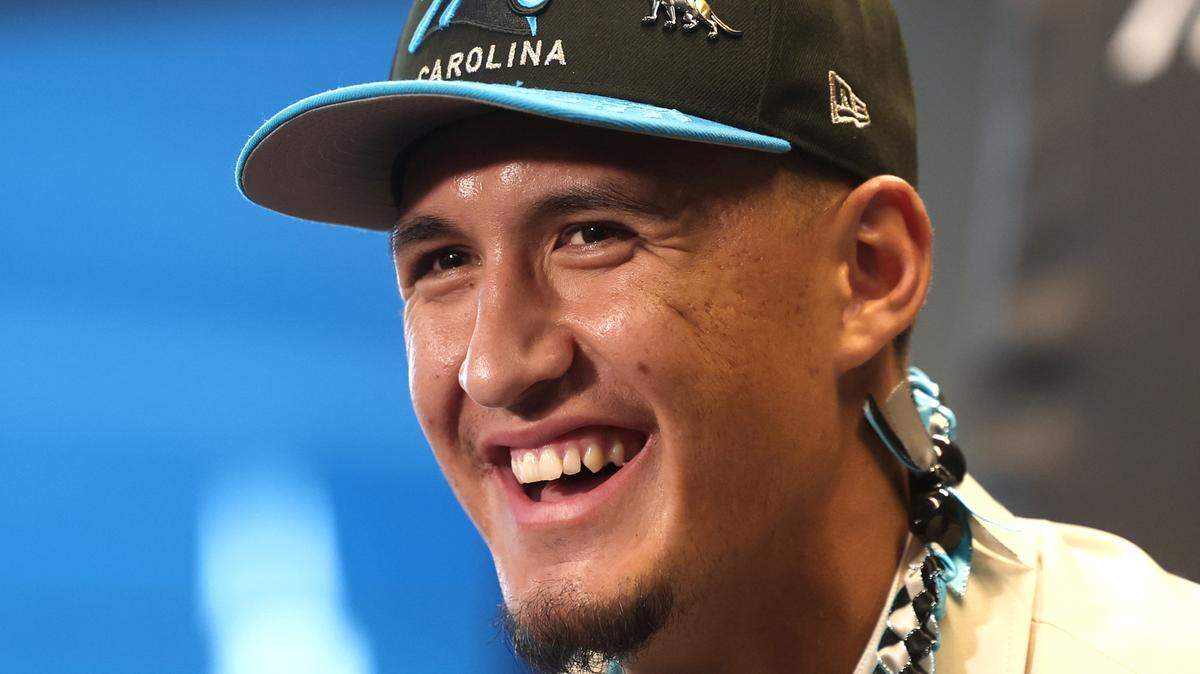 Carolina Panthers draft pick Tetairoa McMillan laughs while responding to a question during a press conference at Bank of America Stadium on Friday, April 25, 2025. The Panthers selected McMillan with the eighth pick in the 2025 NFL Draft.