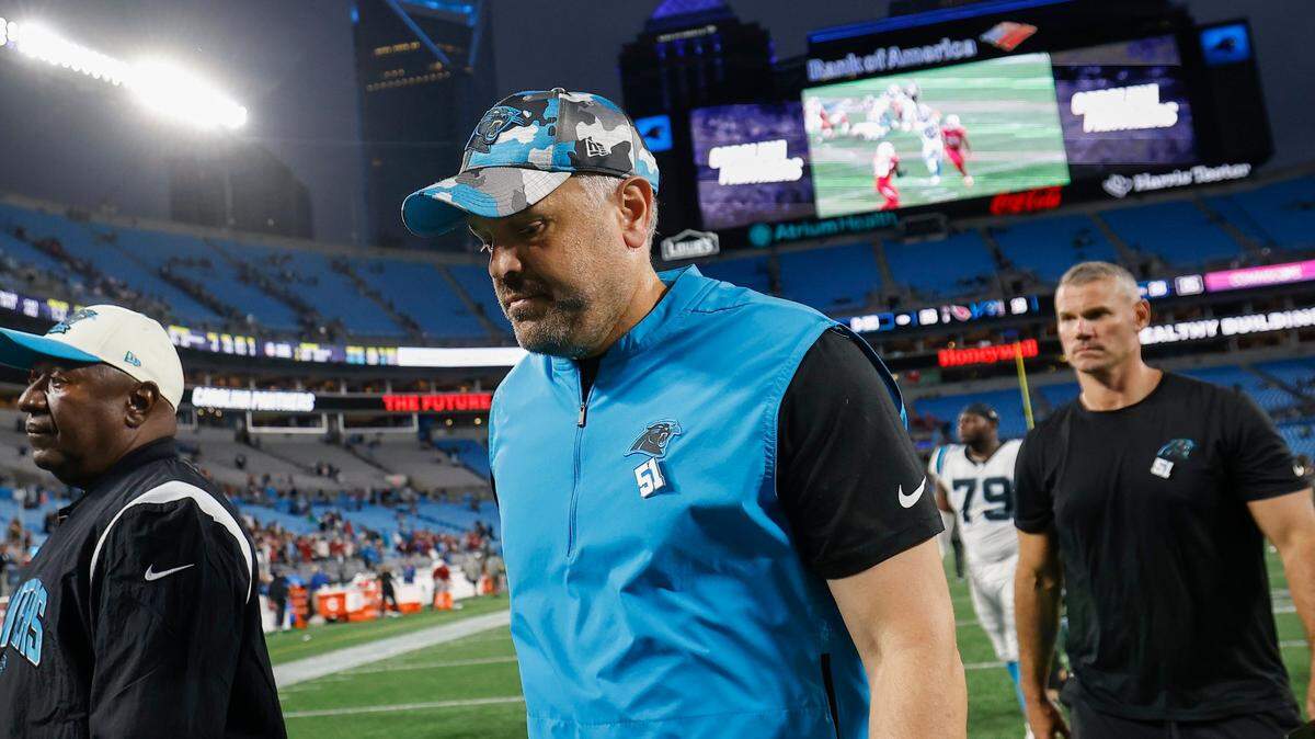 Carolina Panthers head coach Matt Rhule leaves the field after the teams 26-16 loss to the Arizona Cardinals during at Bank of America Stadium in Charlotte, N.C., Sunday, Oct. 2, 2022.