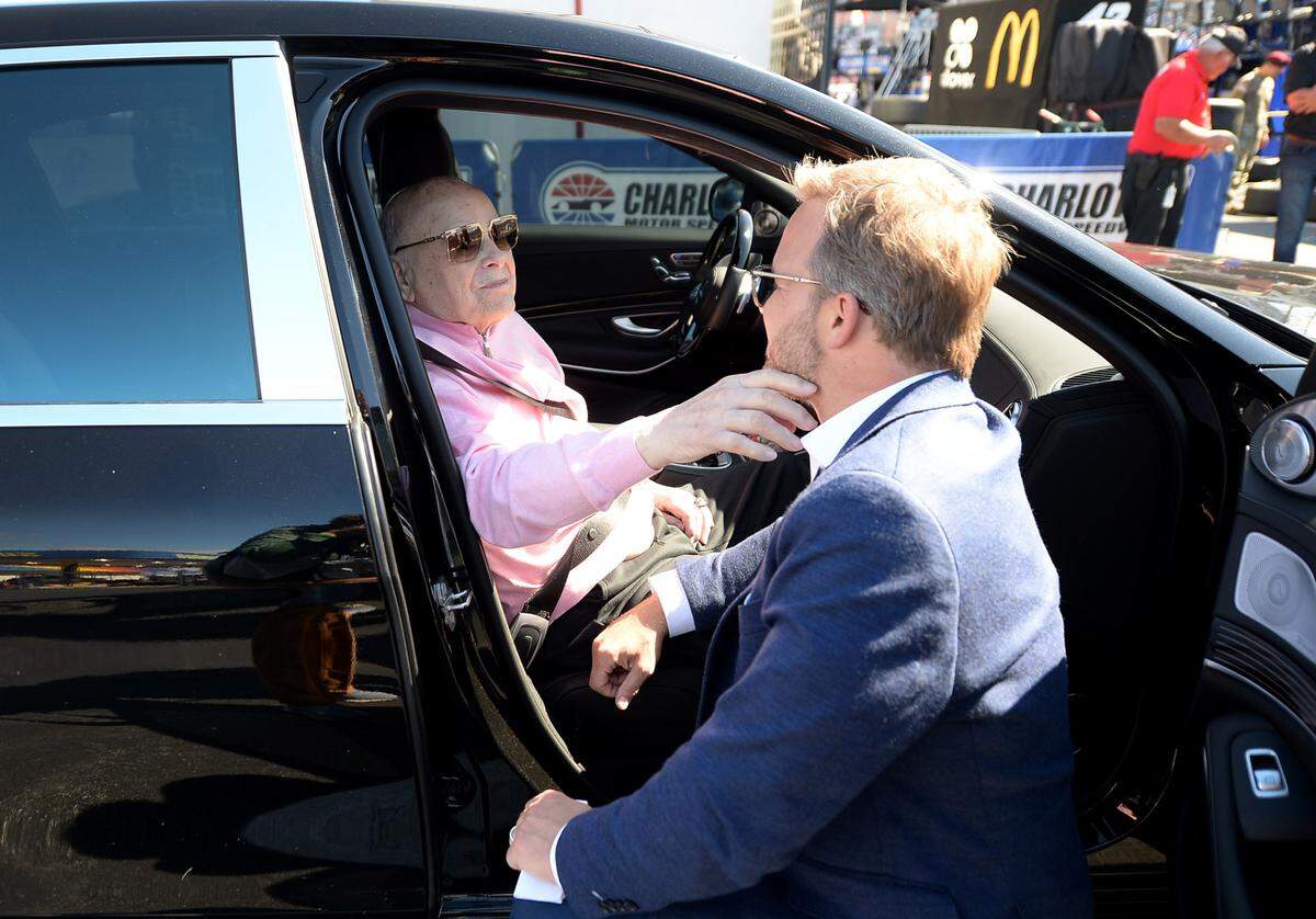 NASCAR Hall of Famer Bruton Smith, left, rubs his son, Marcus SmithÕs face and tells him that he loves him along pit road at Charlotte Motor Speedway on Sunday, May 30, 2021. The speedway is hosting the Coca-Cola 600 race.