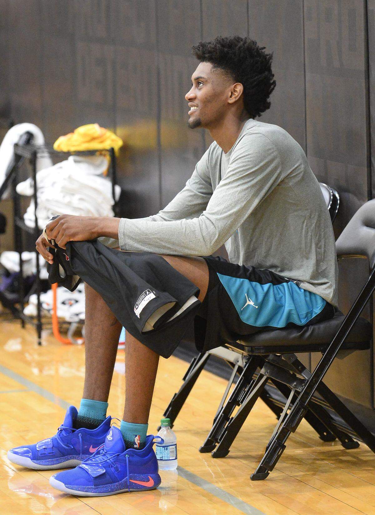 Jalen McDaniels, a Charlotte Hornets’ second-round draft pick in 2019, sits on the sideline after practice Monday. McDaniels spoke to the media a few minutes later about the secret sex videos he recorded in high school that have led to two civil lawsuits.