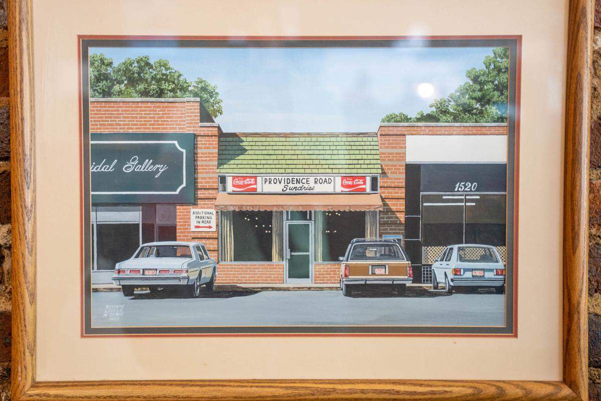 A 1983 painting of Providence Road Sundries by Risden Little McElroy.