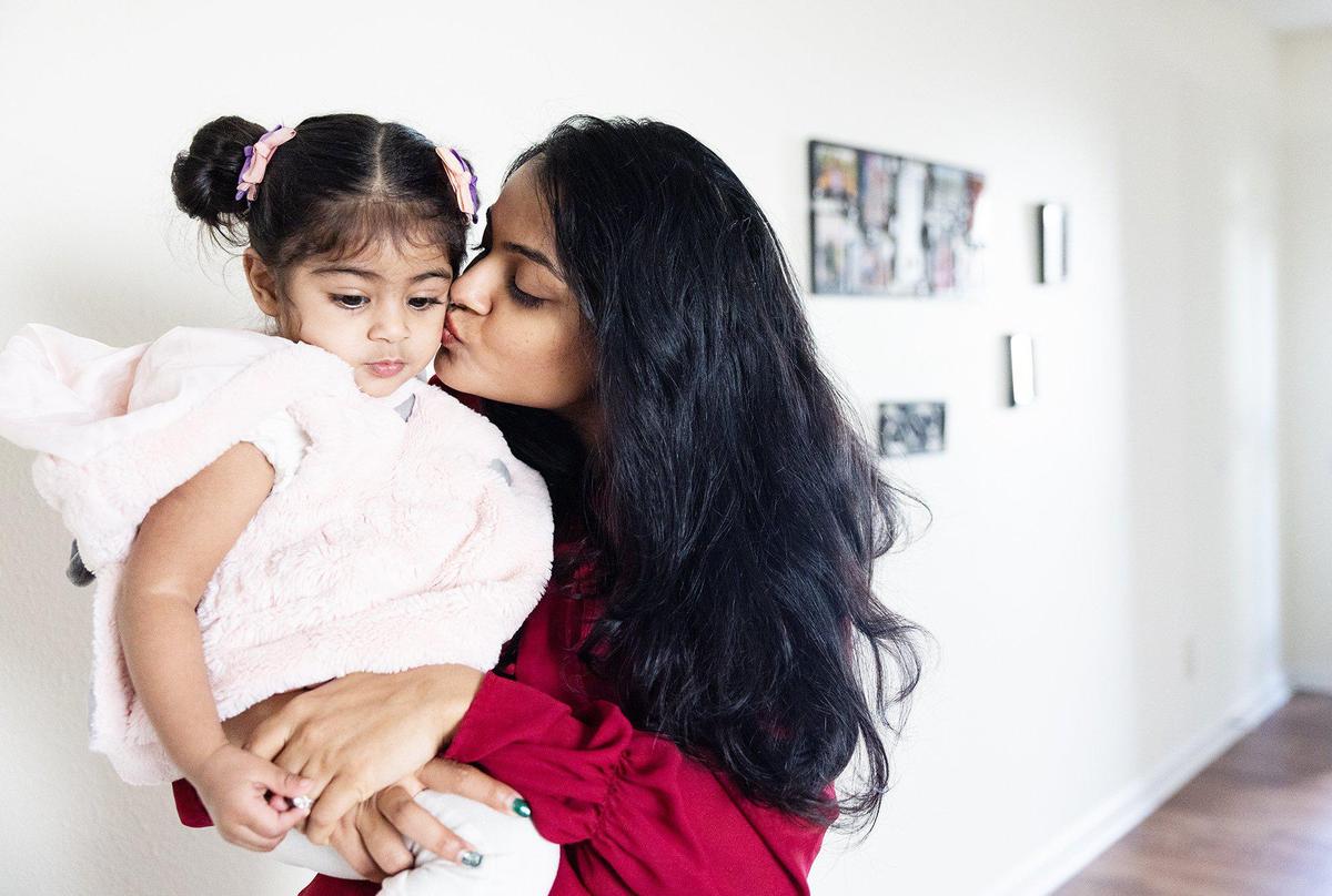 Councilwoman Dimple Ajmera, right, poses for a portrait with her daughter, Charlotte in Charlotte, N.C., on Thursday, February 16, 2023.