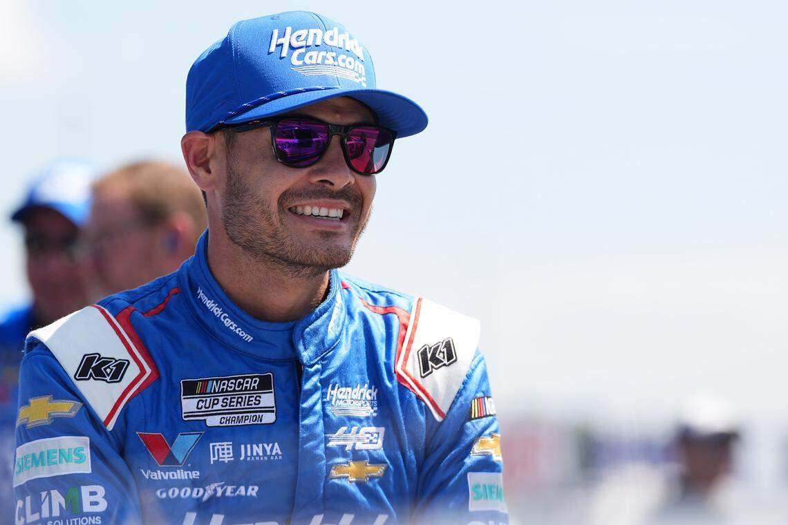Aug 31, 2024; Darlington, South Carolina, USA; NASCAR Cup Series driver Kyle Larson (5) sits by his car prior to practice for the Cook Out Southern 500 at Darlington Raceway.