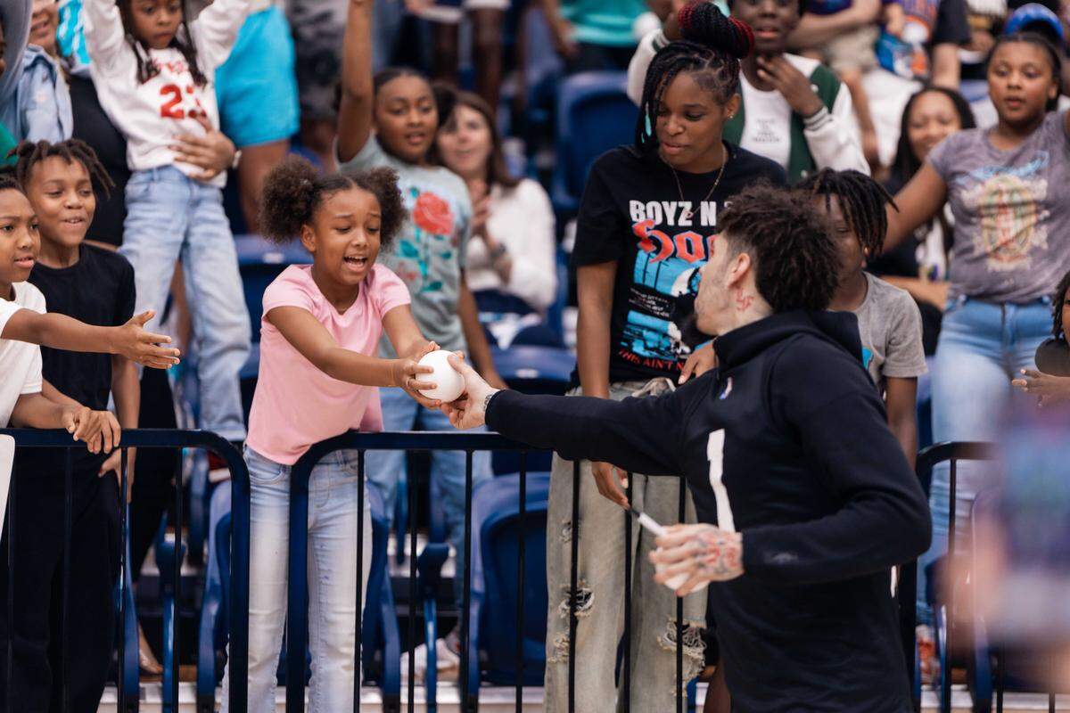 Charlotte Hornets star LaMelo Ball interacts with fans during team’s purple & teal scrimmage at Queens University on Tuesday, October 7, 2025.