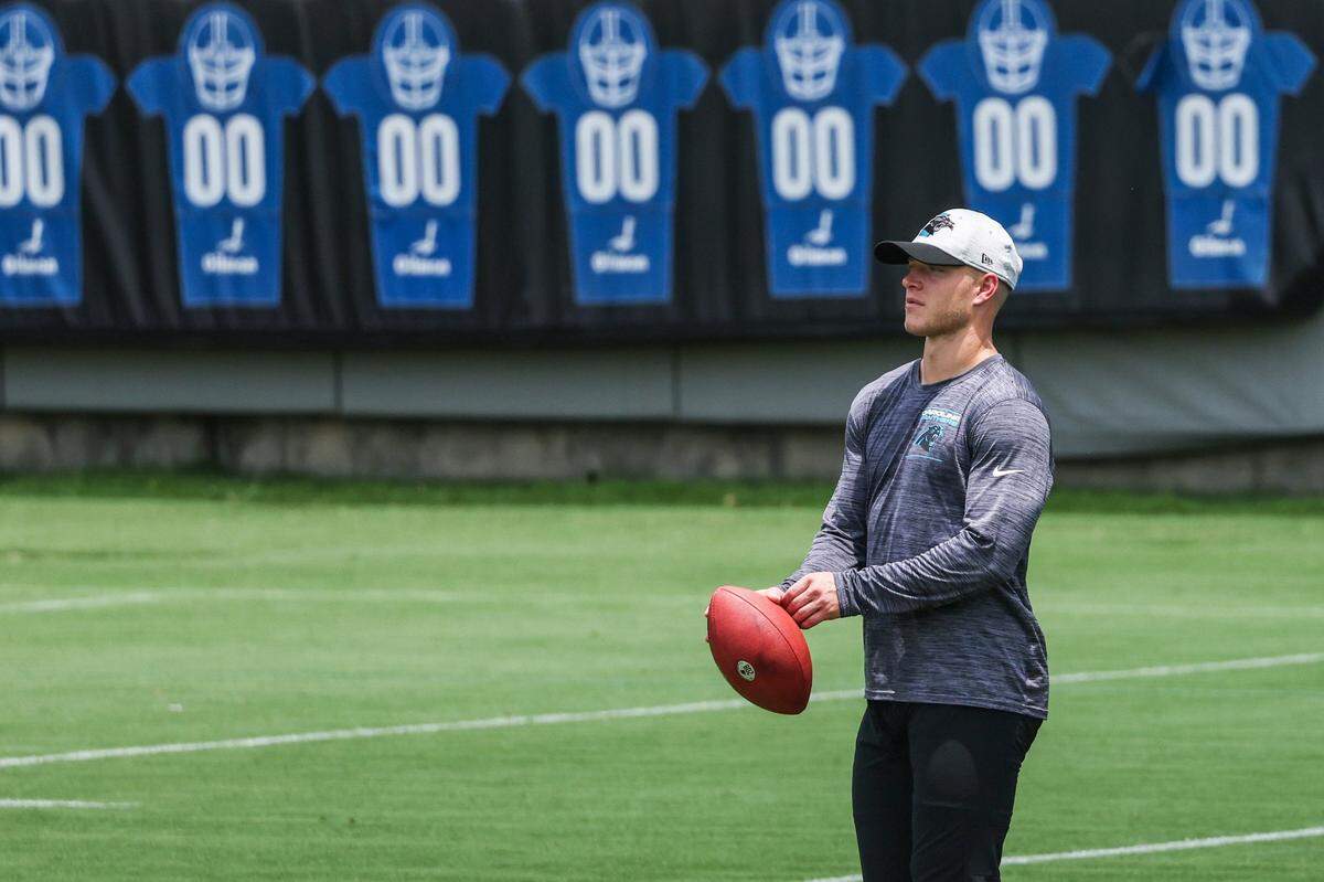 Panthers running back Christian McCaffrey attends practice, but does not participate, during day two of mini camp on Wednesday, June 15, 2022 in Charlotte, NC.