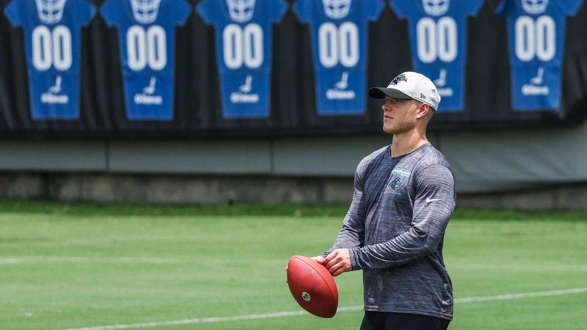 Panthers running back Christian McCaffrey attends practice, but does not participate, during day two of mini camp on Wednesday, June 15, 2022 in Charlotte, NC.