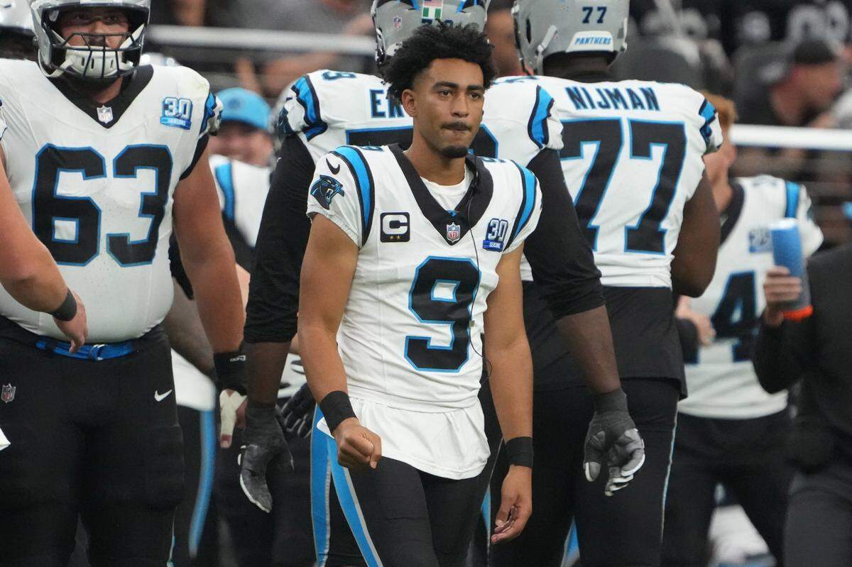 Sep 22, 2024; Paradise, Nevada, USA; Carolina Panthers quarterback Bryce Young (9) watches from the sidelines against the Las Vegas Raiders in the second half at Allegiant Stadium. Mandatory Credit: Kirby Lee-Imagn Images