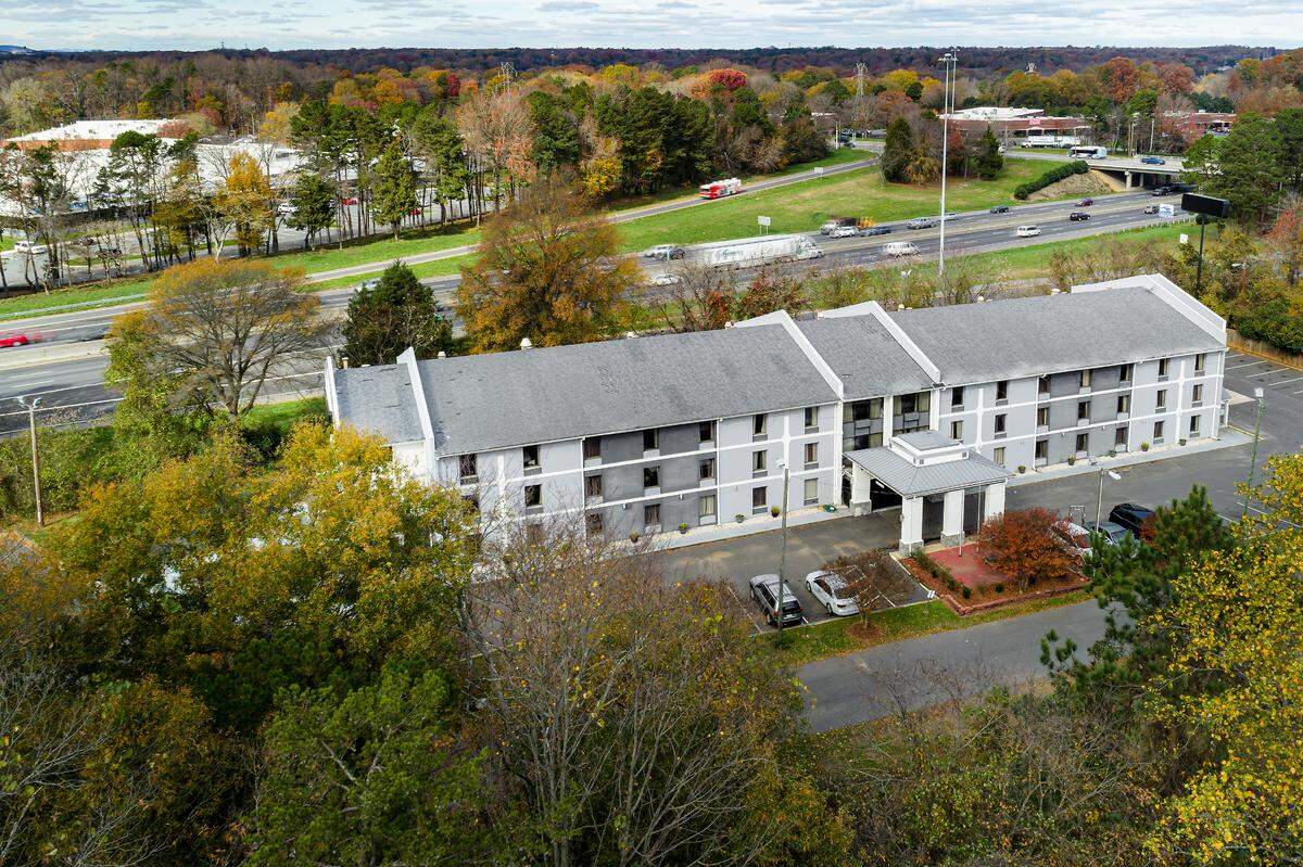 Roof Above purchased the former Quality Inn hotel on Clanton Road, just off Interstate 77 southwest of uptown Charlotte, in December 2020. After being used as an emergency shelter, the building is now home to an innovative approach to affordable housing.
