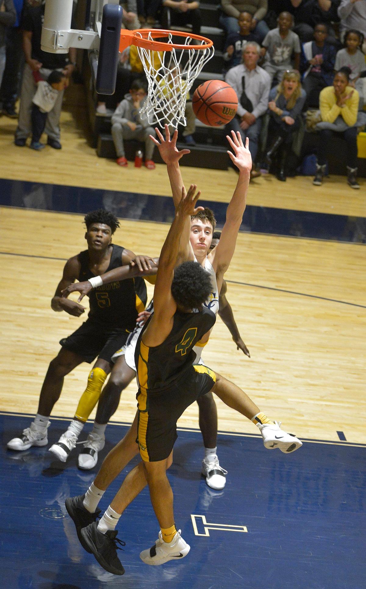 Independence #4 Raja Milton hits the winning shot as Independence beats Carmel Christian by one point in overtime during Saturday’s Independence at nationally ranked Carmel Christian basketball game at Carmel Christian.Independence is the reigning N.C. 4A public school state champion. Carmel Christian is the reigning N.C. 2A independent School state champ.