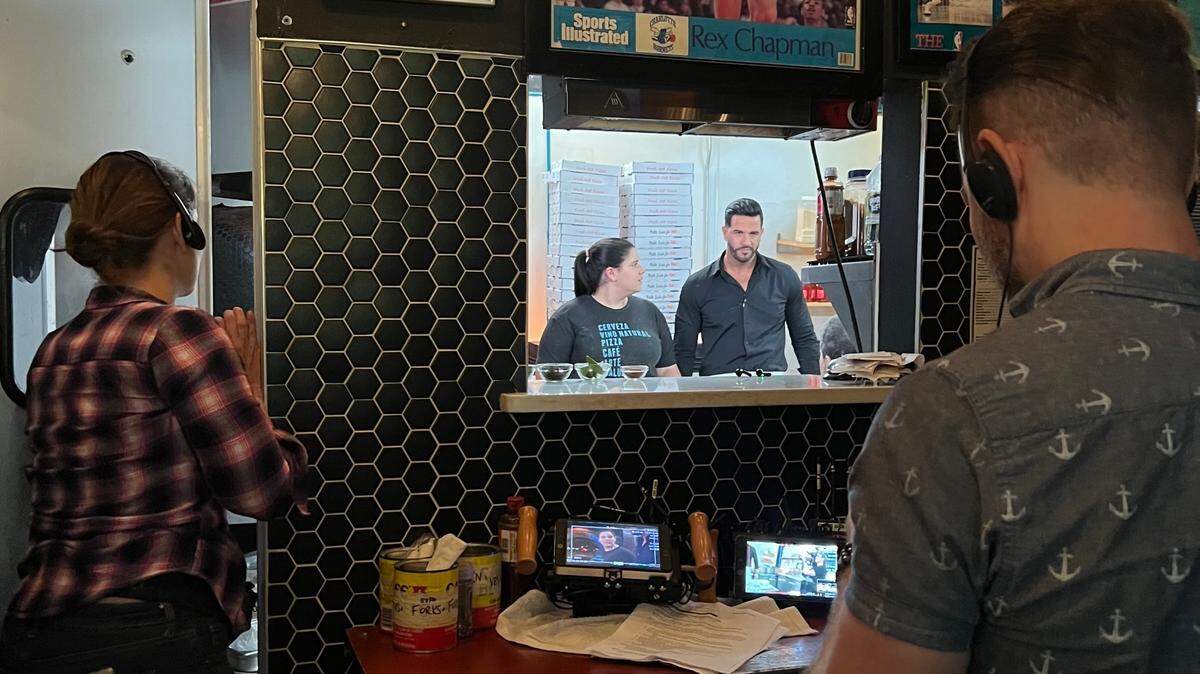 A camera crew films Salud pastry chef Jessica Ceara and “Que Delicia: El Sabor De America” host Jesús Diaz for a recently aired episode featuring Latin-owned restaurants in Charlotte.
