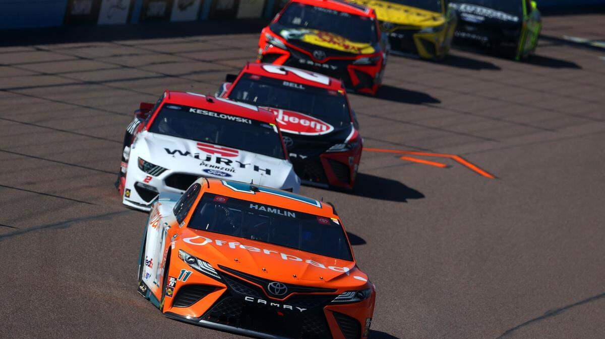 AVONDALE, ARIZONA - MARCH 14: Denny Hamlin, driver of the #11 Offerpad Toyota, leads the field during the NASCAR Cup Series Instacart 500 at Phoenix Raceway on March 14, 2021 in Avondale, Arizona. (Photo by Abbie Parr/Getty Images)