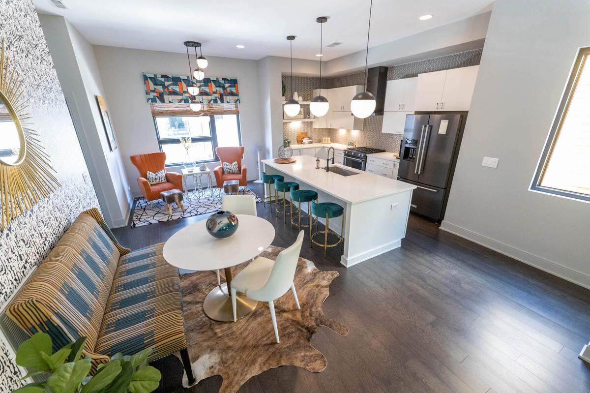 Rachel and Craig Richards turned their dining nook into a seating area and then utilized a space on the other side of the kitchen island for dining.