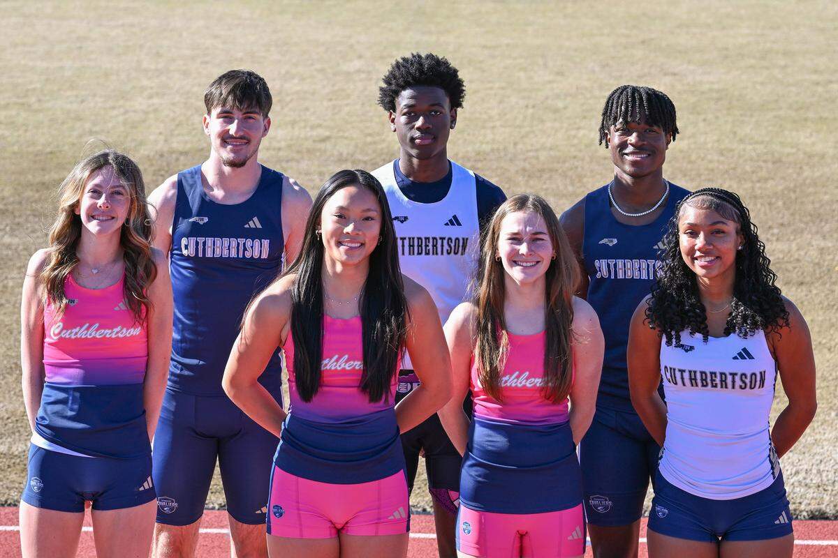 (From left) Cuthbertson track athletes Coby McCollum, Aronne Cosentino, Sophie Hoang, Tommy Pringle, Morgan Edwards, Brenden Robbins and Tatiana Blake pose for a photo last season in Waxhaw.