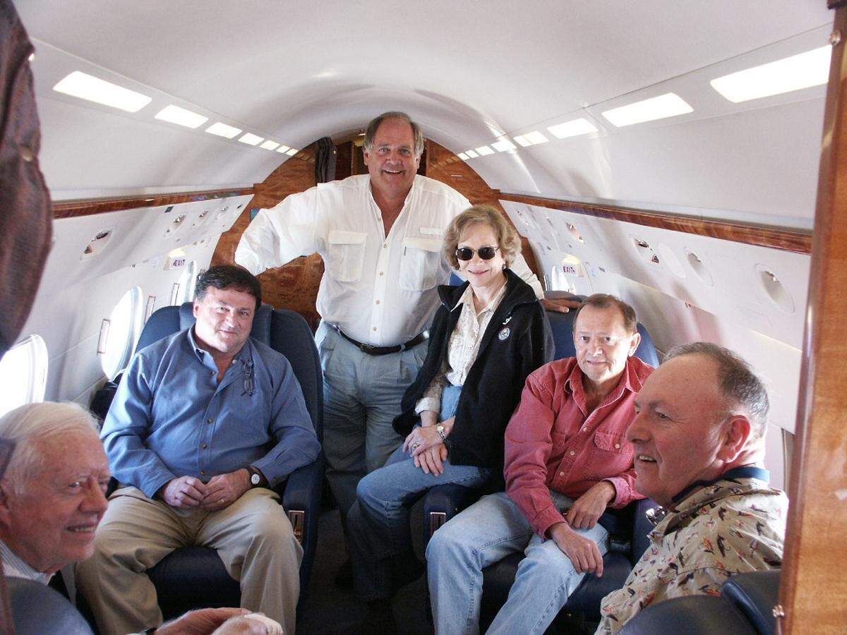 The fishing group headed for Kamchatka in eastern Russia, from left: Jimmy Carter, John Moores, Bob Wilson, Rosalynn Carter, Carlton Hicks and Wayne Harpster.