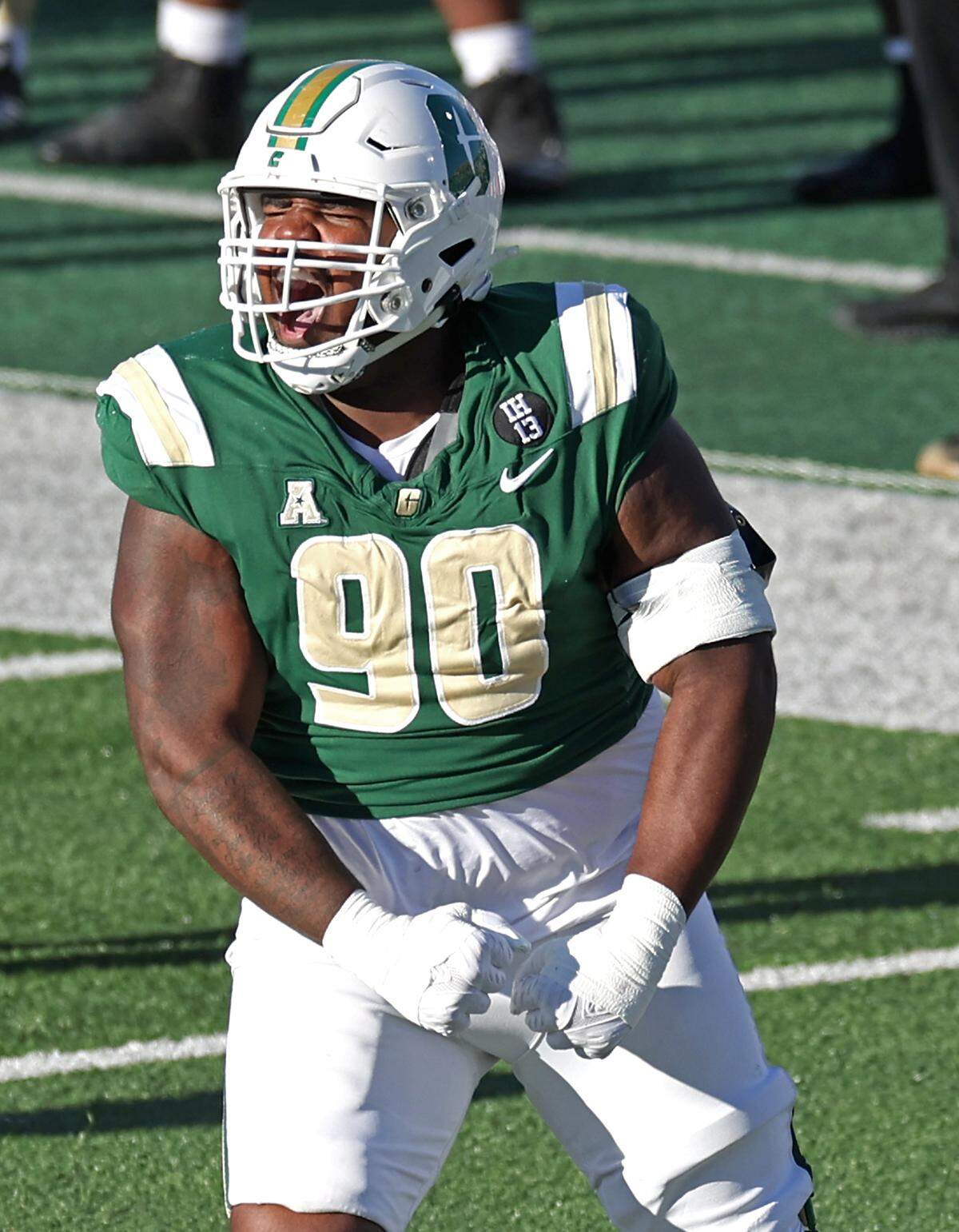 Charlotte 49ers defensive lineman Dez Morgan celebrates a stop of the South Florida offense during action on Saturday, November 16, 2024 at Jerry Richardson Stadium.