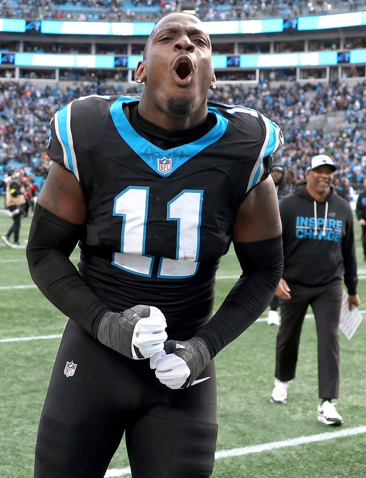 Carolina Panthers linebacker Nic Scourton celebrates the team’s 23-20 victory over the Tampa Bay Buccaneers on Dec. 21, 2025, at Bank of America Stadium.