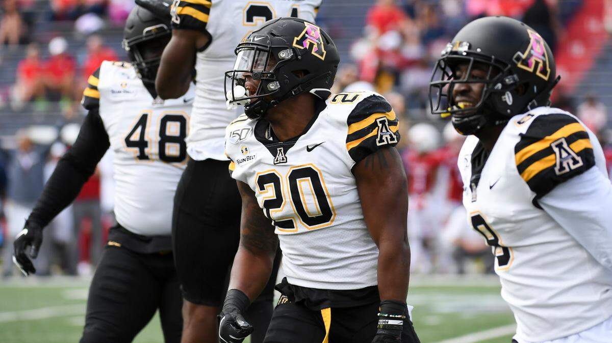 Appalachian State wide receiver Sean Horton (20) and teammates celebrate a blocked field goal during the second half of an NCAA college football game against South Alabama, Saturday, Oct. 26, 2019, at Ladd-Peebles Stadium in Mobile, Ala. (AP Photo/Julie Bennett)