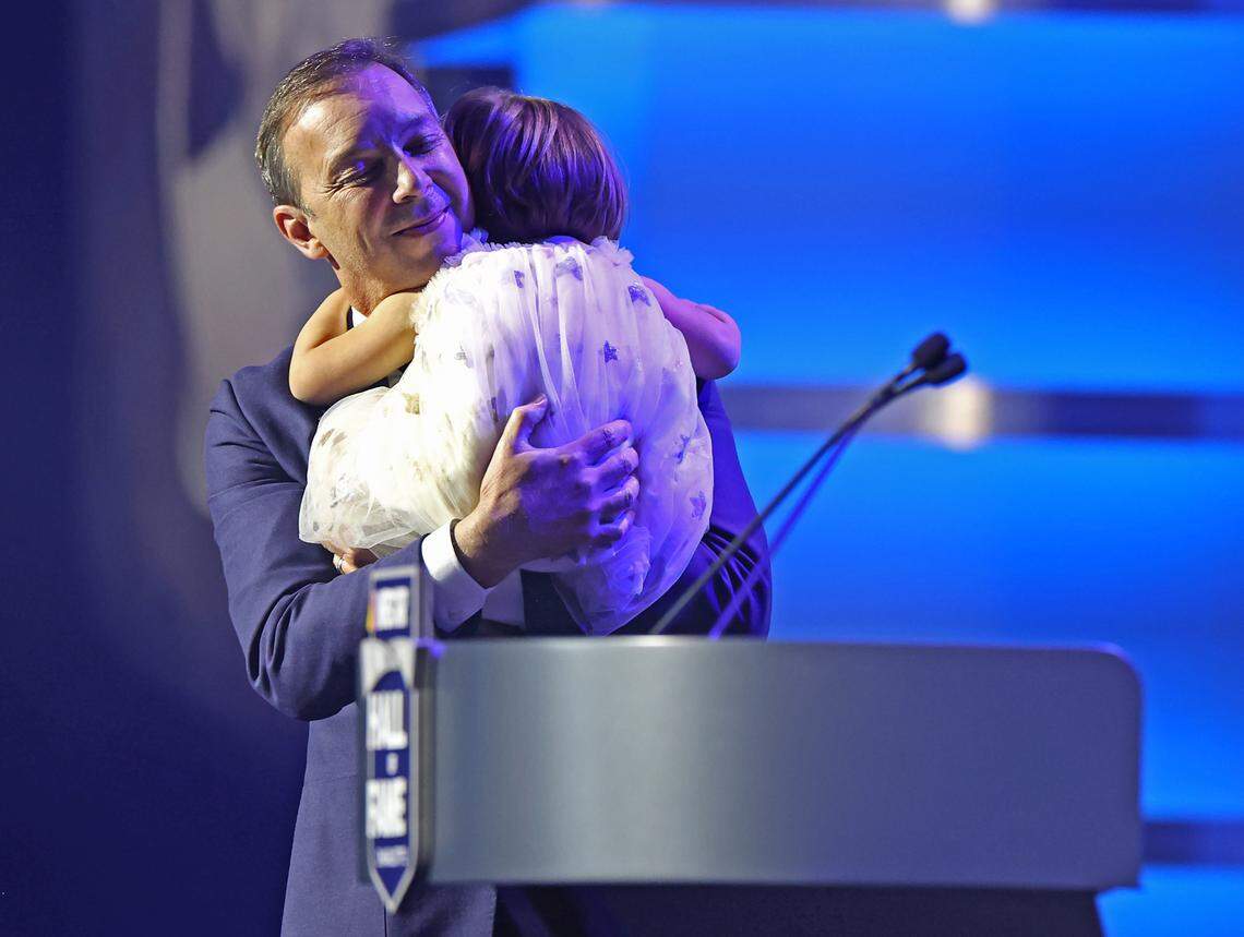 NASCAR Hall of Fame member Chad Knaus hugs his daughter, Vivienne during the NASCAR Hall of Fame induction ceremony in Charlotte, NC on Friday, January 19, 2024.
