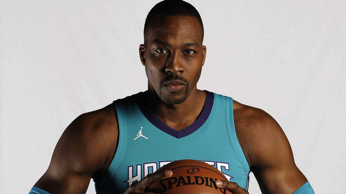 The Charlotte Hornets have agreed to trade eight-time All-Star center Dwight Howard (above) to the Brooklyn Nets for center Timofey Mozgov and two second-round draft picks, Observer sources confirmed.