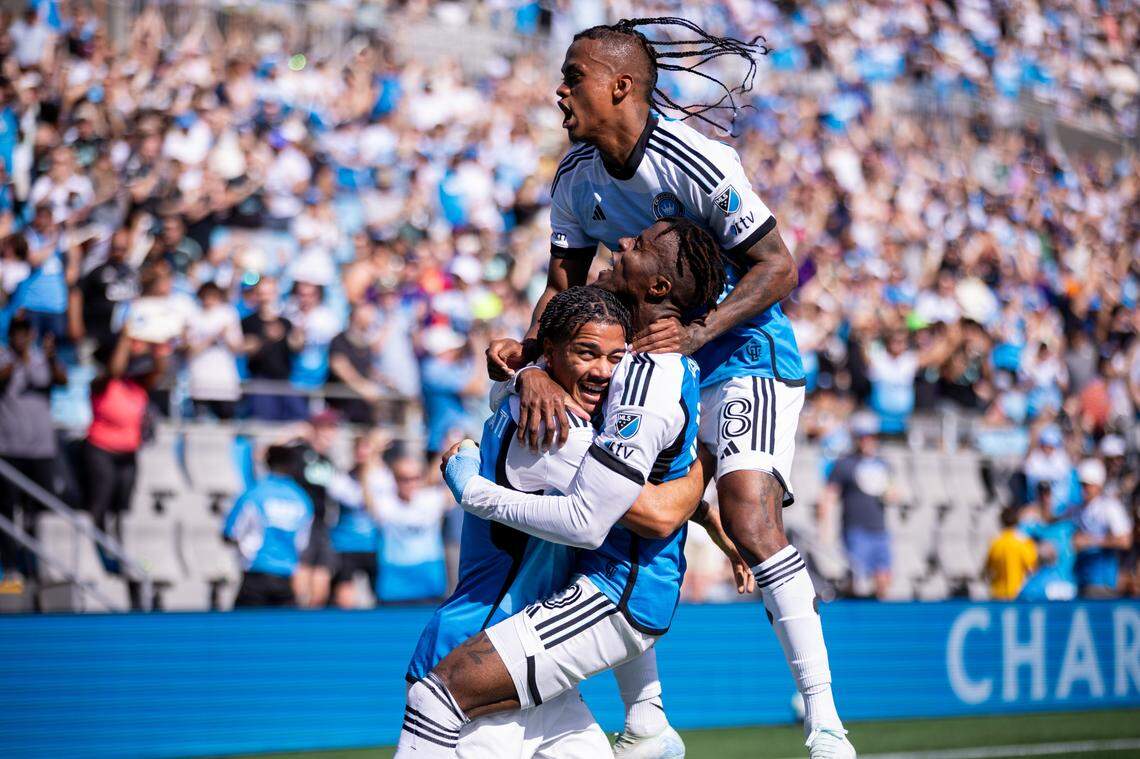 Charlotte FC forward Idan Toklomati (17) celebrates with forward Wilfried Zaha (10) and forward Kerwin Vargas (18) after scoring against the Nashville SC during a game at Bank of America Stadium.