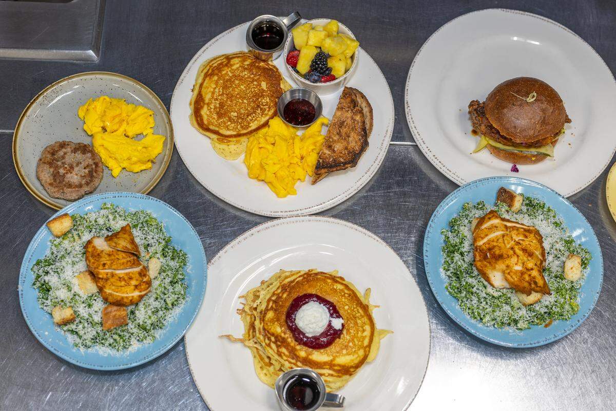 “I believe in using food to tell a story. When I moved up here from New Orleans, that’s when I recognized how culturally significant New Orleans is as a food city. … Very few food dishes come from a cultural perspective that don’t have a story behind them,” Chayil Johnson told CharlotteFive. Shown above are some of his dishes from Community Matters Cafe.