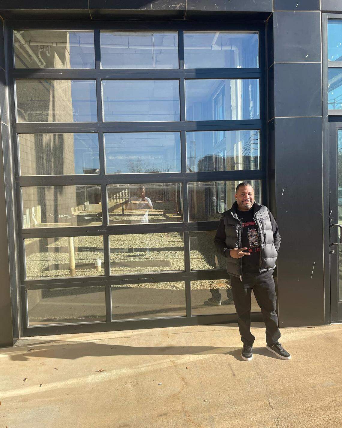 Hippin’ Hops owner Clarence Boston stands next to the site of Hippin’ Hops Brewery that is expected to open next summer in Charlotte’s NoDa neighborhood.