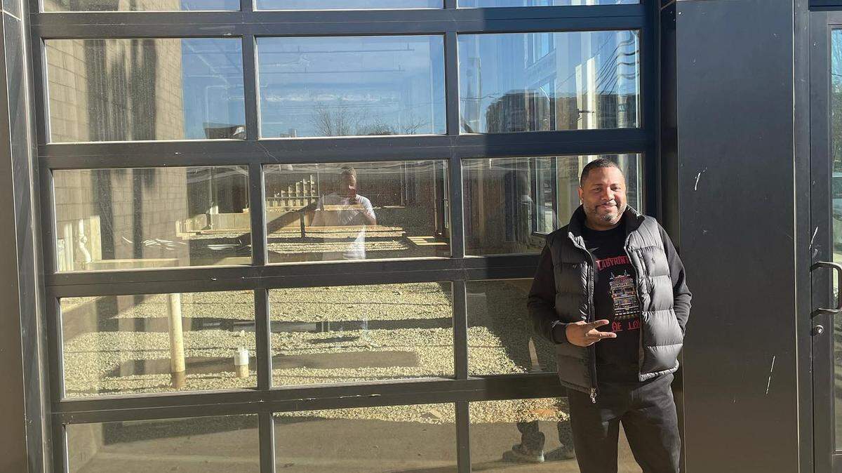 Hippin’ Hops owner Clarence Boston stands next to the site of Hippin’ Hops Brewery that is expected to open next summer in Charlotte’s NoDa neighborhood.