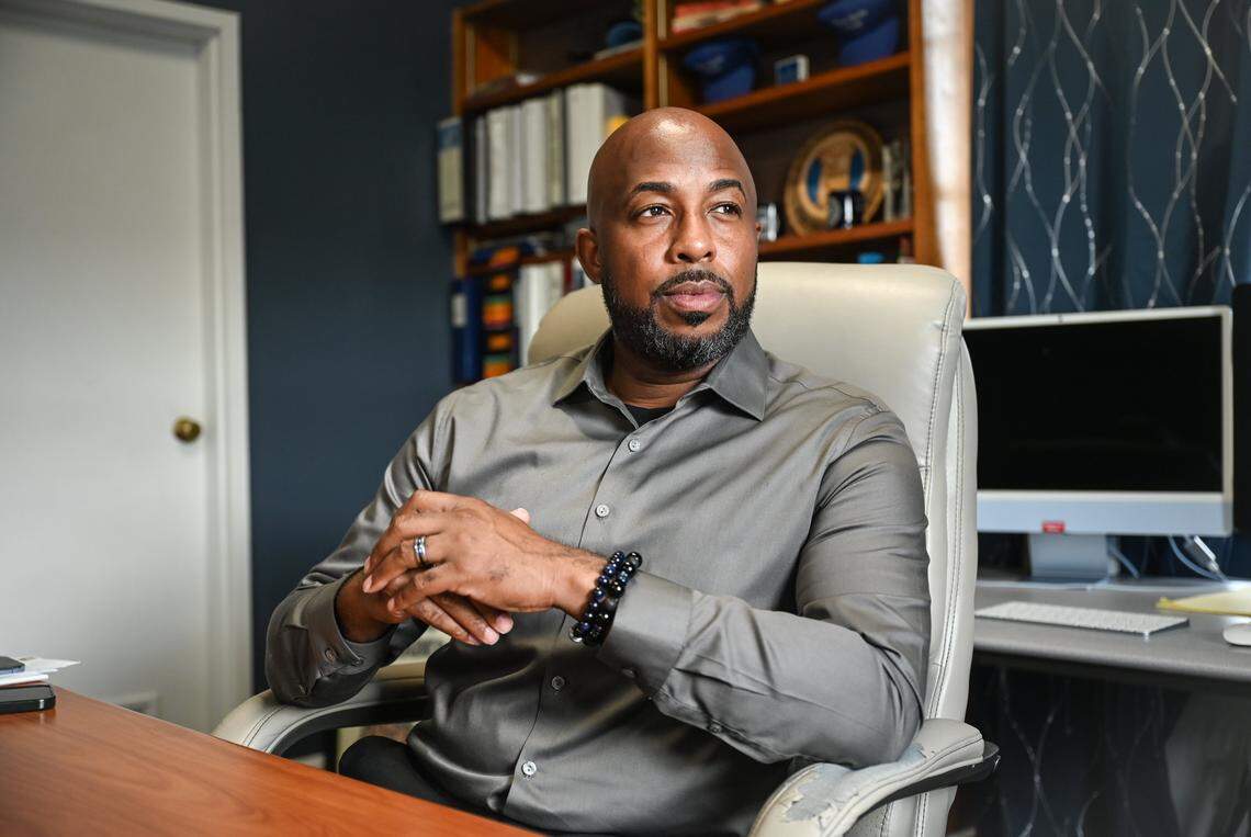 Chris Rey, president of Barber-Scotia College, poses in his office at the school in Concord. Rey is entering his third year of heading the college that lost its accreditation 22 years ago. 