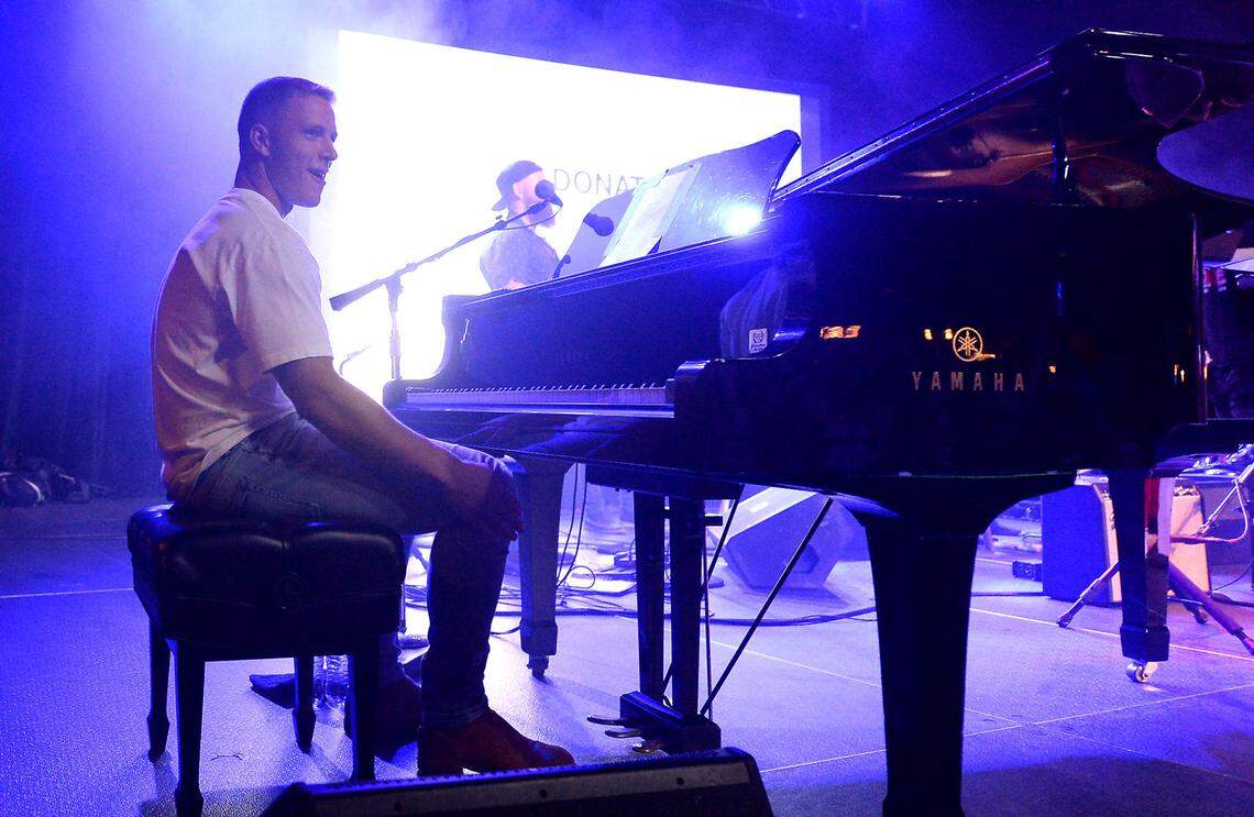 Christian McCaffrey on the piano during the early part of Friday night's concert.