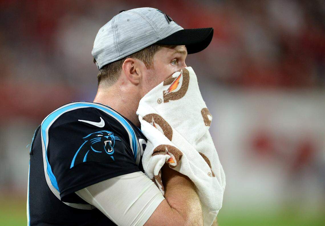 Carolina Panthers quarterback Sam Darnold looks out onto the field after throwing an interception to the Tampa Bay Buccaneers during fourth quarter action at Raymond James Stadium in Tampa, Fl. on Sunday, January 9, 2022. The Panthers lost to the Buccaneers 41-17.