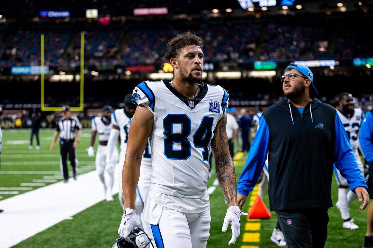 Sep 8, 2024; New Orleans, Louisiana, USA; Carolina Panthers tight end Feleipe Franks (84) walks off the field before the game against the New Orleans Saints at Caesars Superdome. Mandatory Credit: Stephen Lew-Imagn Images