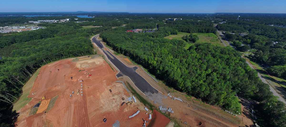 The proposed pad of a Lowes grocery store is pictured to the left and N.C. 115 to the right in this picture of the East West Connector under construction off Langtree Road in Mooresville near Lake Norman.