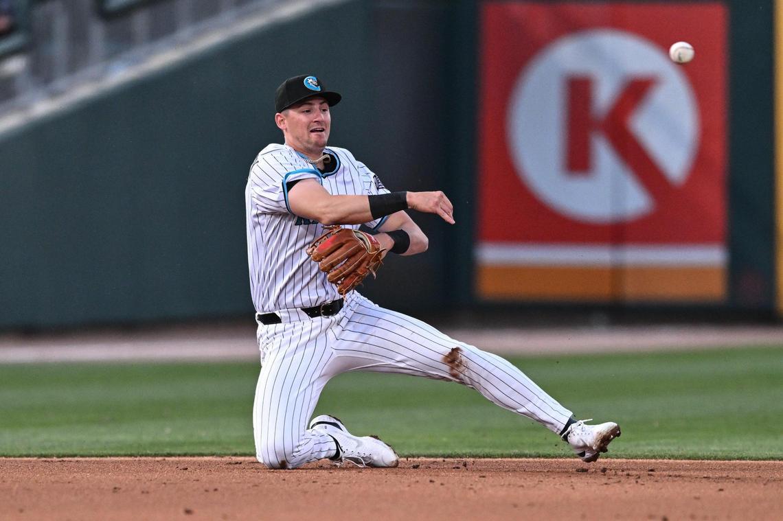 Charlotte Knights infielder Colson Montgomery turns a double play during the second inning of a Minor League Baseball game against the Gwinnett Stripers in March.