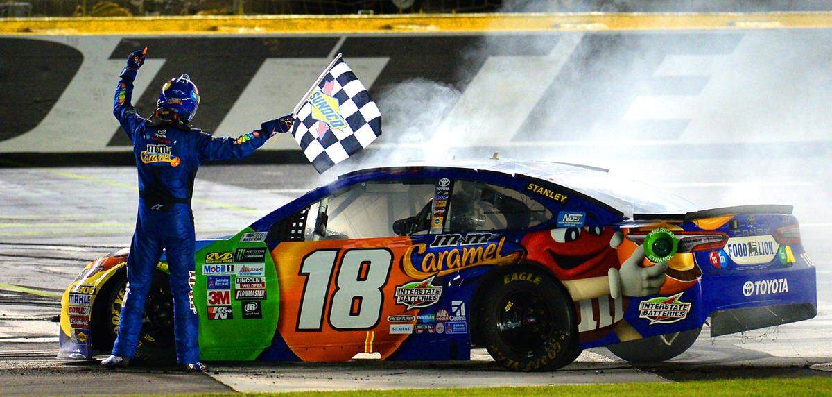 NASCAR driver Kyle Busch acknowledges the cheers of the fans after winning the NASCAR Monster Energy All-Star Race on Saturday, May 20, 2017 at Charlotte Motor Speedway in Concord, NC. 