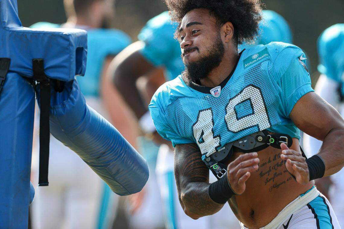Carolina Panthers linebacker Frankie Luvu runs a drill during practice at the NFL football team’s training camp in Spartanburg, S.C., Sunday, Aug. 8, 2021.
