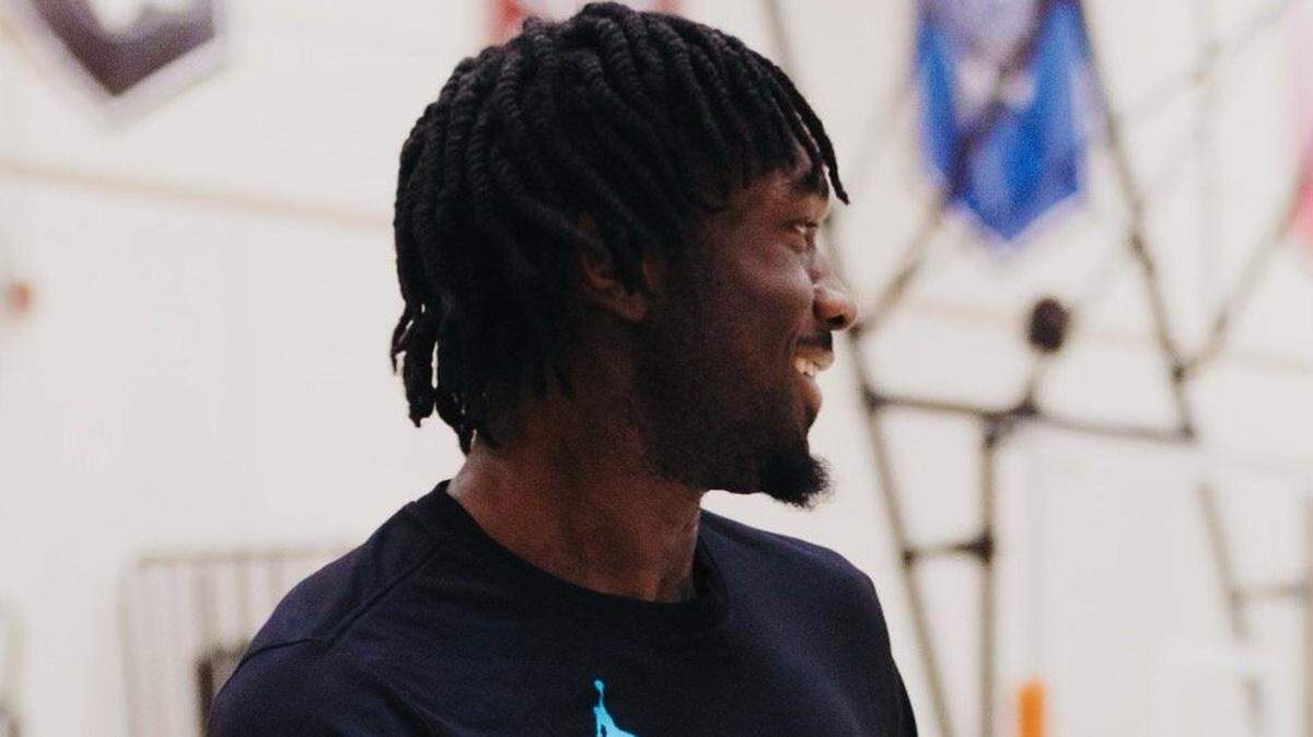 Charlotte Hornets center Mark Williams is all smiles following a workout.
