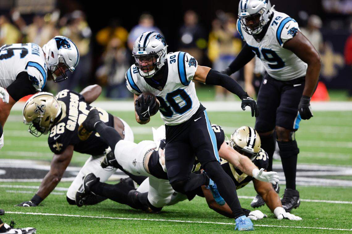 Carolina Panthers running back Chuba Hubbard runs during the first half an NFL football game between the Carolina Panthers and the New Orleans Saints in New Orleans, Sunday, Jan. 8, 2023. (AP Photo/Butch Dill)
