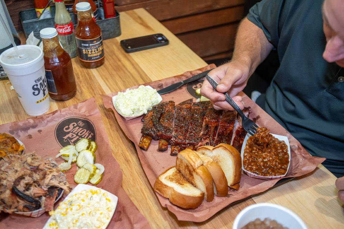 The ribs plate at The Smoke Pit with baked beans and slaw.