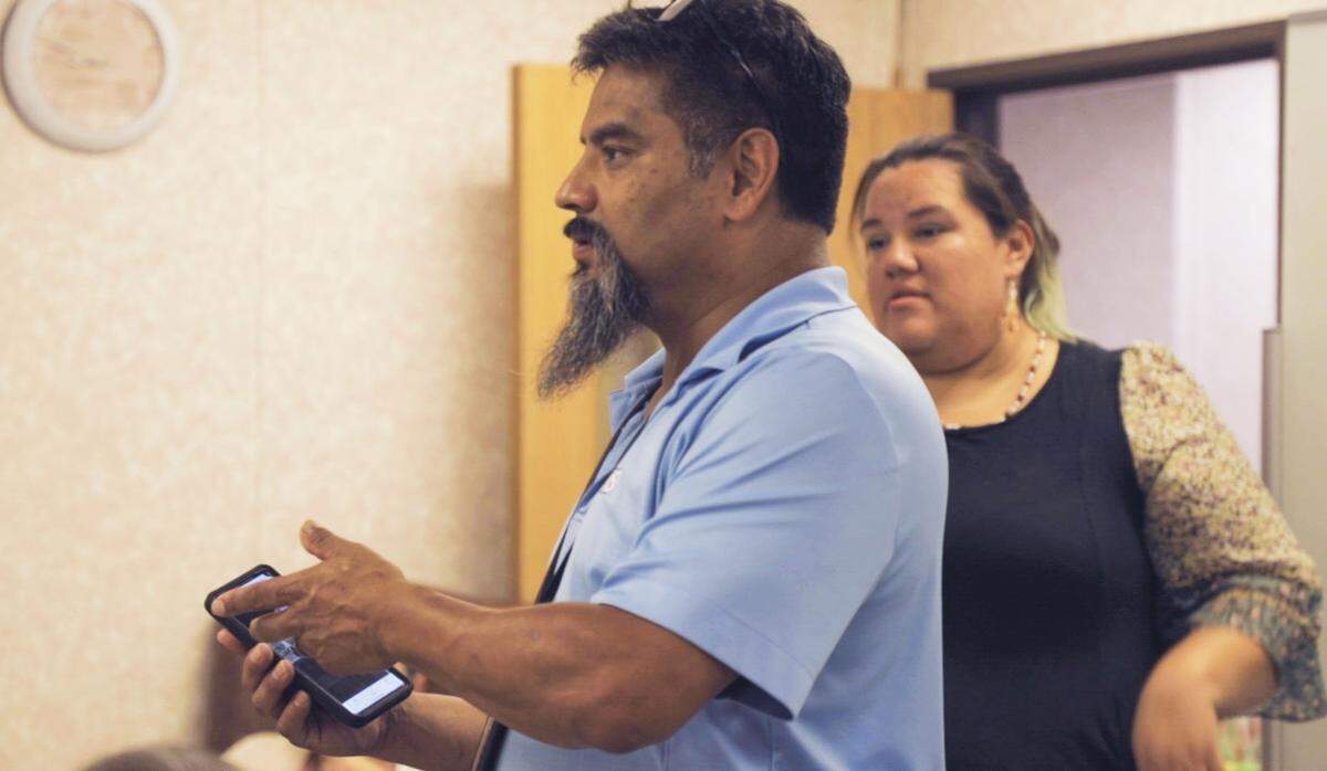 Bo Lossiah, Curriculum & Instruction Supervisor, leads a discussion at the Cherokee Speakers Gathering on Thursday, August 3, 2023, at the Kituwah Preservation and Education teaching module building.