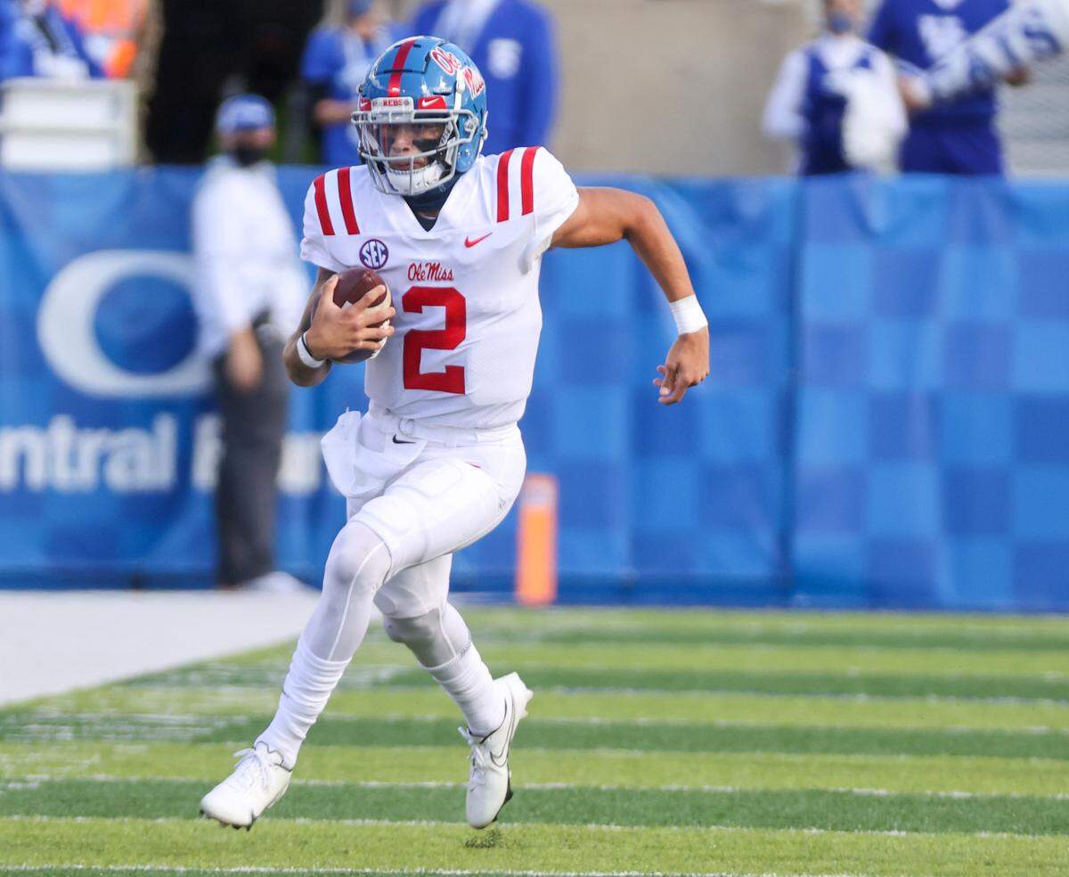 Ole Miss quarterback Matt Corral runs the football vs. Kentucky in 2020. The Panthers traded up to grab Corral with the 94th pick of the 2022 NFL draft.