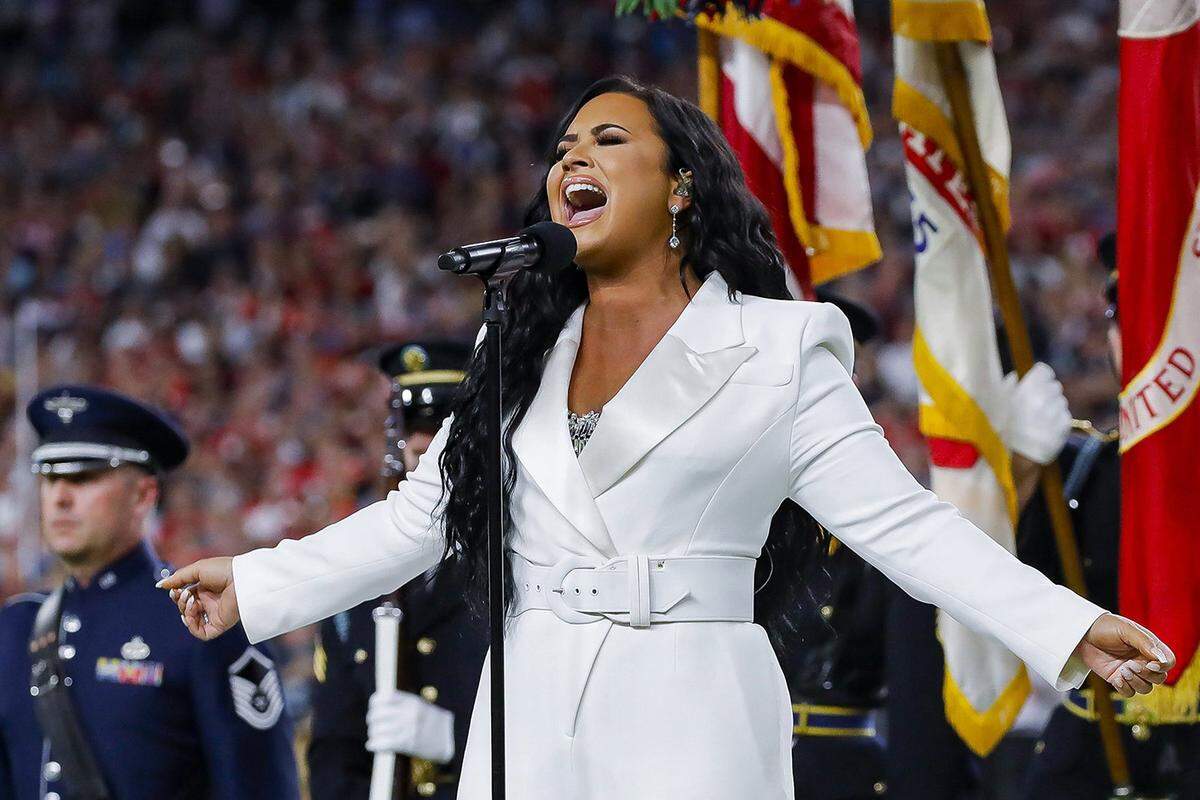 Demi Lovato performs the national anthem at Super Bowl LIV at Hard Rock Stadium in Miami Gardens, Fla., on Feb. 2, 2020.
