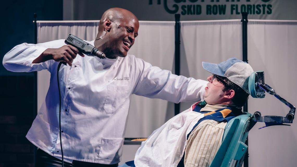 Dr. Nehemiah Lawson looks to drill home his point as crazed dentist Dr. Orin Scrivello DDS in a scene from Theatre Charlotte’s “Little Shop of Horrors.”
