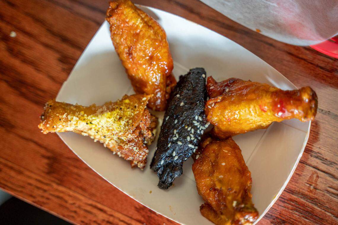 A variety of wings at Wing King Cafe in Charlotte. Ming Wings in the middle, and clockwise: sweet chili, honey hot, garlic lemon pepper and traditional buffalo.