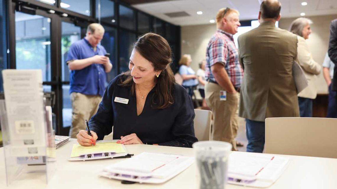 Kimberly Owens fills out form to run for Charlotte City Council District 6 at Mecklenburg County elections filing on Monday, July 7, 2025.