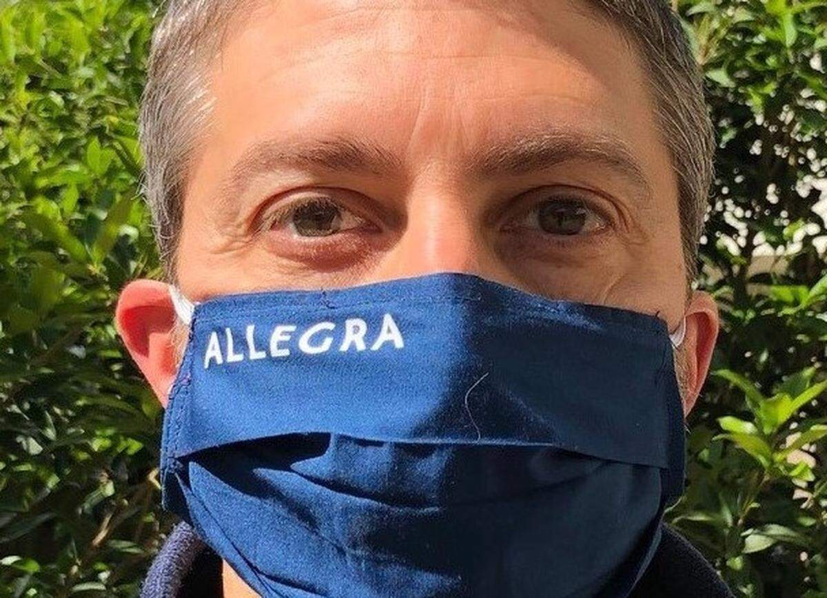 Matt Kinser is the owner of Allegra, a printing company in South End that is now offering masks.
