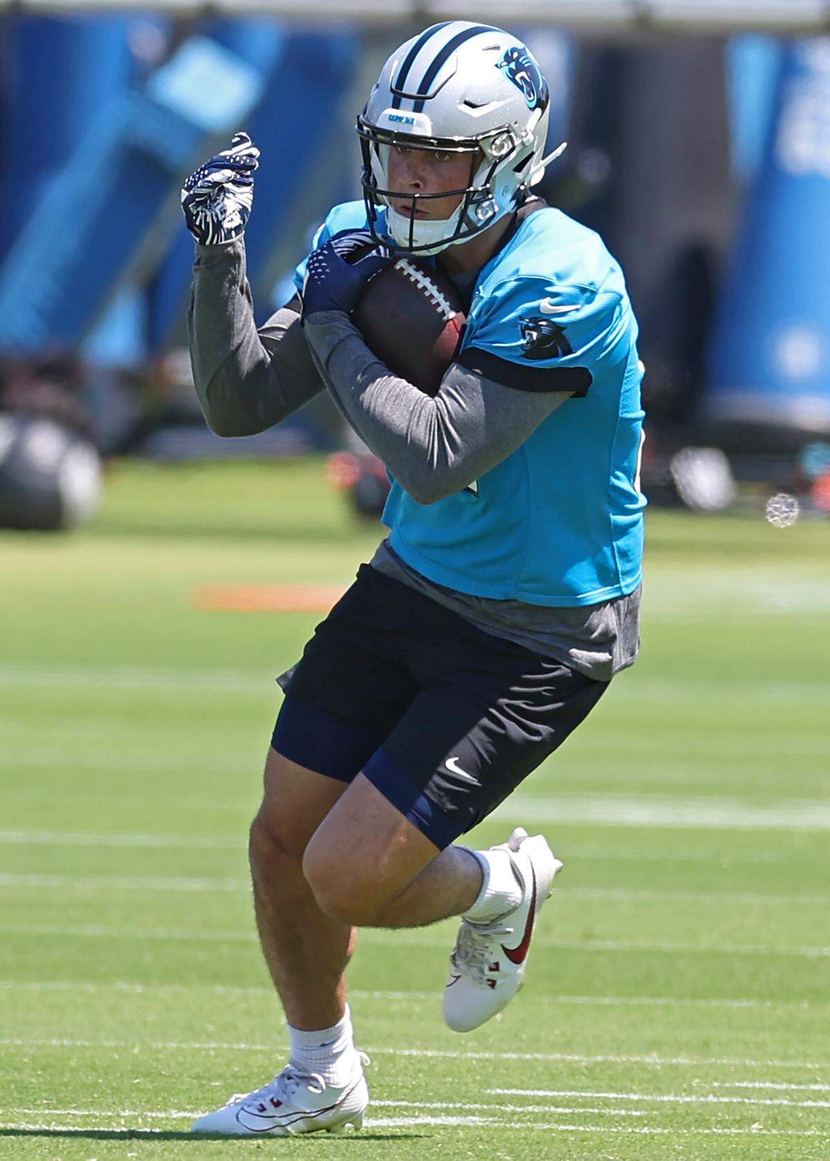 Carolina Panthers tight end Graham Walker runs downfield after catching a pass during the team’s rookie minicamp practice on Friday, May 9, 2025.